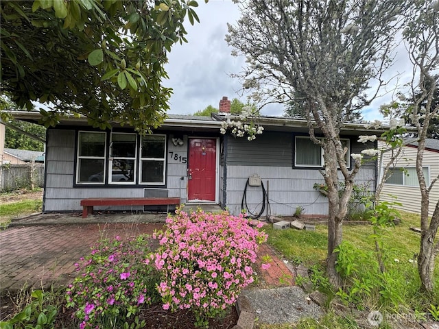7815 203rd St SW, Edmonds, WA 98026 - view of front facade featuring a chimney