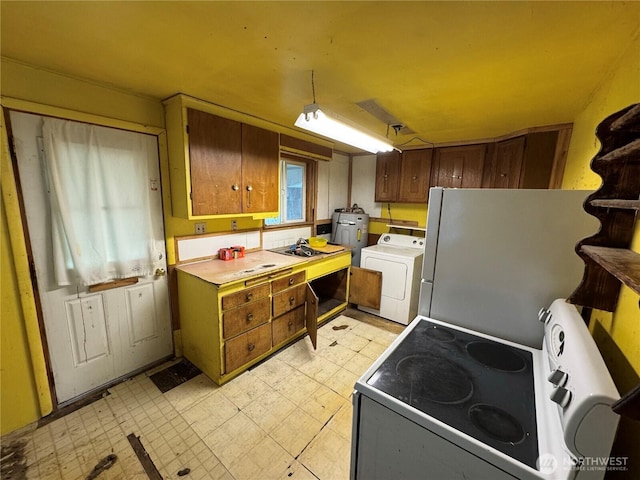 7815 203rd St SW, Edmonds, WA 98026 - kitchen with white appliances, washer / clothes dryer, light floors, and light countertops