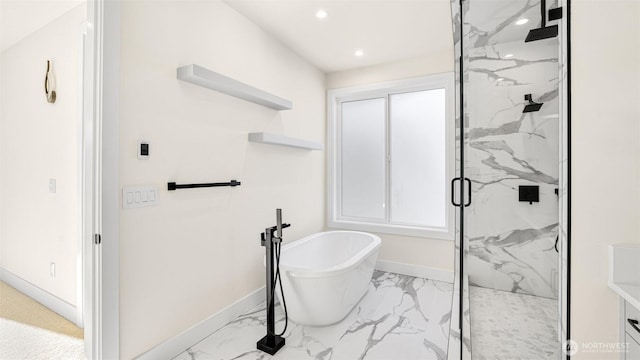 17109 NE 16th Pl, Bellevue, WA 98008 - full bath with marble look tile flooring, a marble finish shower, a freestanding tub, recessed lighting, and baseboards