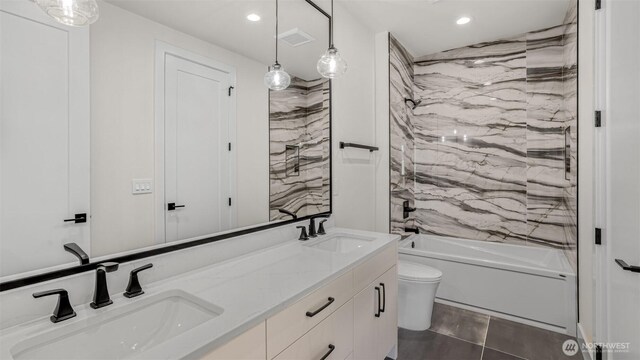 17109 NE 16th Pl, Bellevue, WA 98008 - full bath featuring recessed lighting, toilet, double vanity, and tub / shower combination