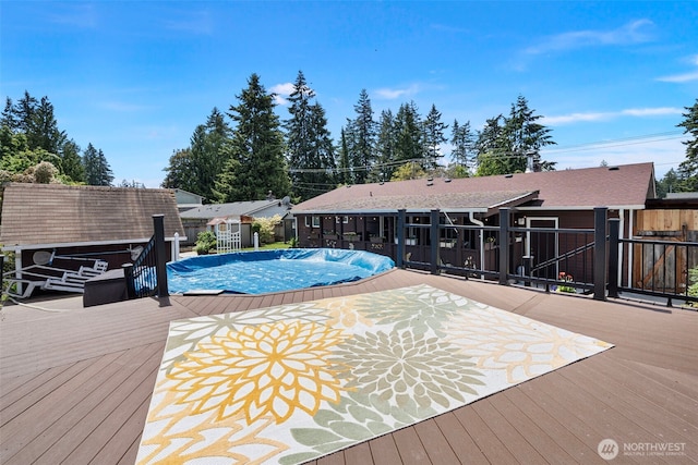 17009 15th Ave E, Spanaway, WA 98387 - view of swimming pool with a wooden deck