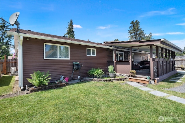 17009 15th Ave E, Spanaway, WA 98387 - rear view of house with a wooden deck and cooling unit