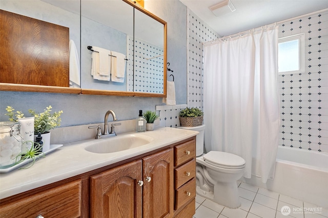 17009 15th Ave E, Spanaway, WA 98387 - full bathroom with tile patterned flooring, vanity, toilet, and shower / bath combination with curtain