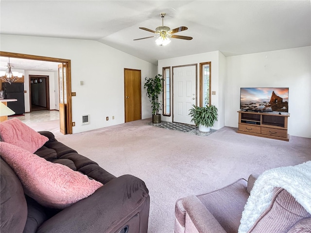 2147 Beverly Blvd, Shelton, WA 98584 - living room featuring lofted ceiling, a ceiling fan, light carpet, and a chandelier