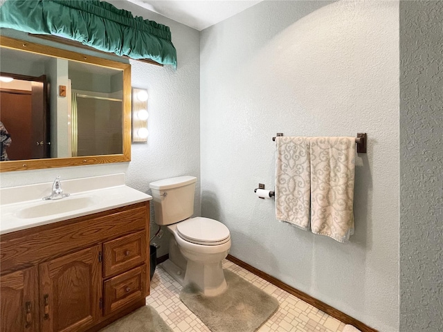 2147 Beverly Blvd, Shelton, WA 98584 - full bath with a shower stall, vanity, toilet, and baseboards