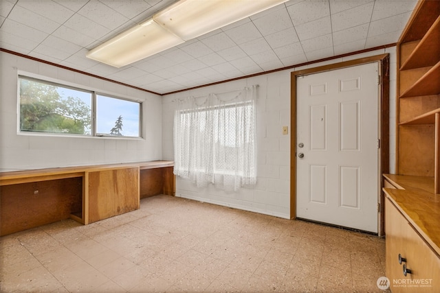 2042 E Harrison St, Tacoma, WA 98404 - unfurnished office featuring light flooring and ornamental molding