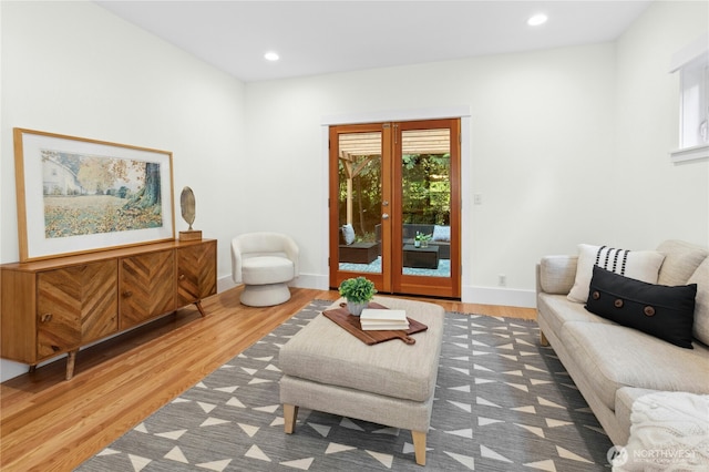 9385 NE N Town Loop, Bainbridge Island, WA 98110 - living area featuring wood finished floors, recessed lighting, and baseboards