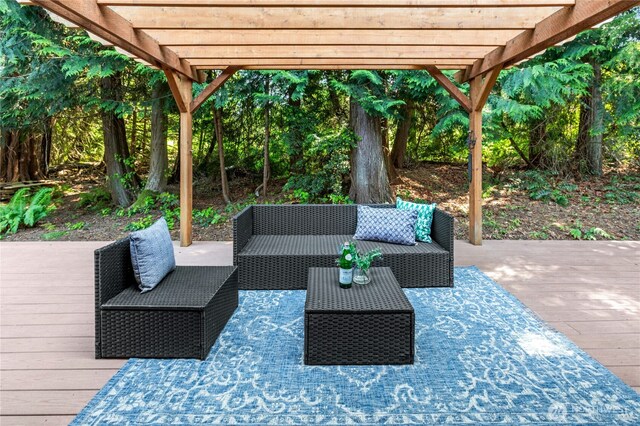 9385 NE N Town Loop, Bainbridge Island, WA 98110 - view of patio featuring an outdoor hangout area, a wooden deck, and a pergola