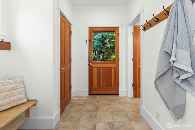 9385 NE N Town Loop, Bainbridge Island, WA 98110 - mudroom featuring baseboards
