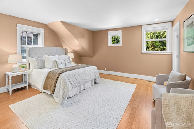 9385 NE N Town Loop, Bainbridge Island, WA 98110 - bedroom with baseboards, light wood finished floors, and recessed lighting