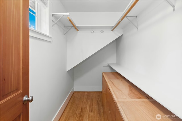 9385 NE N Town Loop, Bainbridge Island, WA 98110 - walk in closet featuring wood finished floors
