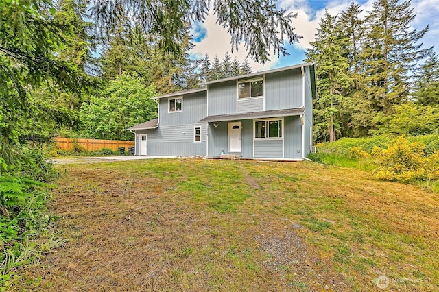 13218 197th St E, Graham, WA 98338 - view of front of property featuring concrete driveway, covered porch, and a garage