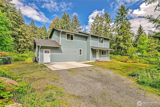 13218 197th St E, Graham, WA 98338 - view of front of property with a patio, driveway, and a front yard