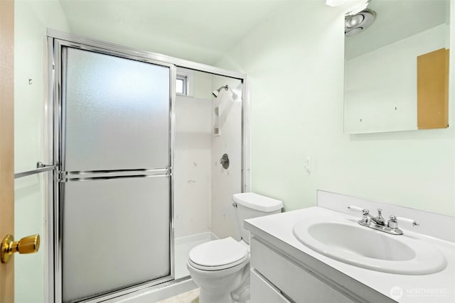 1240 Beach Dr, Camano Island, WA 98282 - bathroom featuring a stall shower, vanity, and toilet