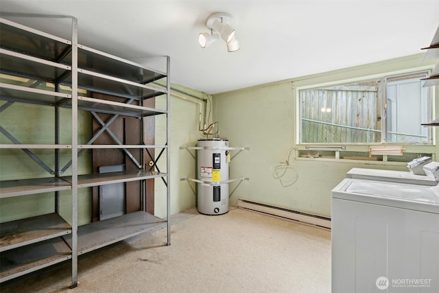 1240 Beach Dr, Camano Island, WA 98282 - below grade area with independent washer and dryer, secured water heater, and a baseboard heating unit