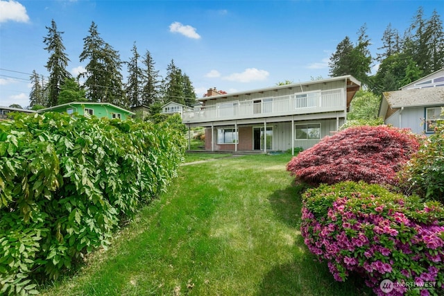 1240 Beach Dr, Camano Island, WA 98282 - rear view of property featuring a yard