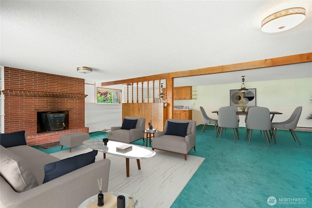 1240 Beach Dr, Camano Island, WA 98282 - carpeted living area with a textured ceiling and a brick fireplace