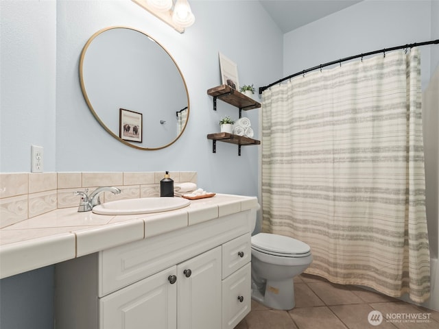 20409 70th St E, Bonney Lake, WA 98391 - full bath with vanity, toilet, and tile patterned floors
