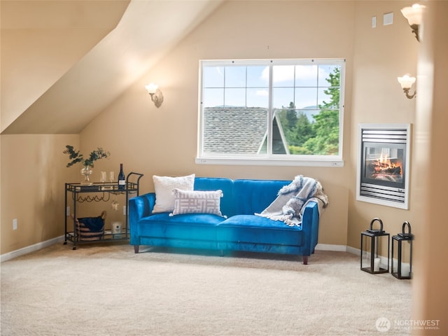 20409 70th St E, Bonney Lake, WA 98391 - sitting room featuring carpet flooring, lofted ceiling, baseboards, and a glass covered fireplace