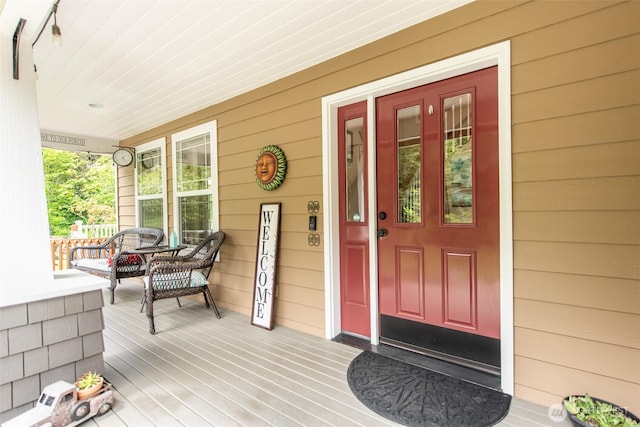 1063 Tamarack Ln, Port Angeles, WA 98362 - doorway to property featuring covered porch