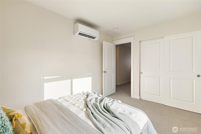 4246 Cameo Ln, Bellingham, WA 98226 - bedroom featuring a wall unit AC, light colored carpet, and baseboards