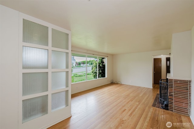 2409 Veldee Ave, Bremerton, WA 98312 - unfurnished living room with light wood finished floors