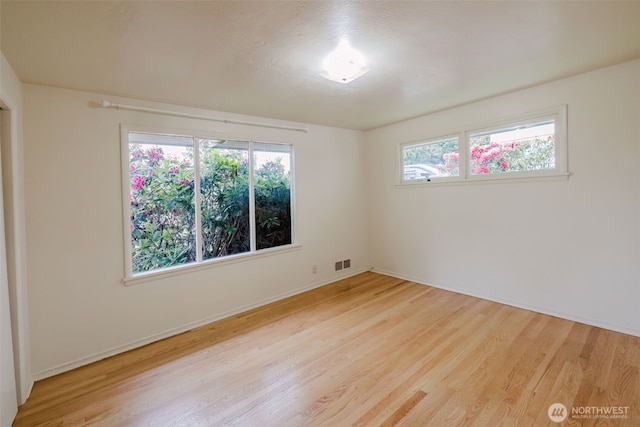 2409 Veldee Ave, Bremerton, WA 98312 - unfurnished room with light wood-type flooring and baseboards