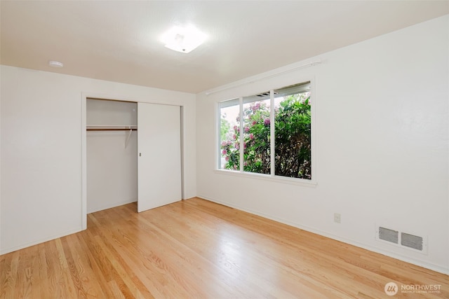 2409 Veldee Ave, Bremerton, WA 98312 - unfurnished bedroom with light wood-type flooring, a closet, and baseboards