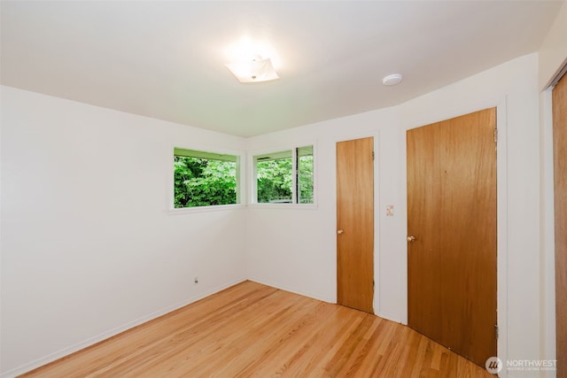 2409 Veldee Ave, Bremerton, WA 98312 - unfurnished bedroom with light wood-type flooring, a closet, and baseboards
