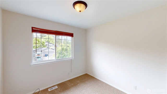 12721 56th Dr NE, Marysville, WA 98271 - empty room with carpet flooring and baseboards