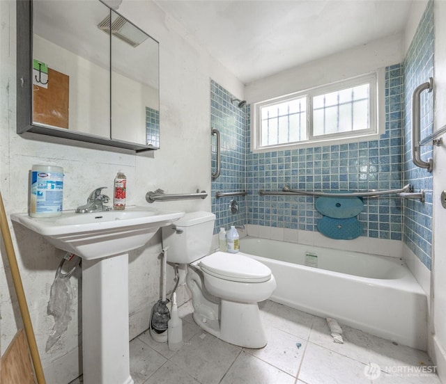 1216 E 70th St, Tacoma, WA 98404 - full bath with toilet, tub / shower combination, and tile patterned flooring