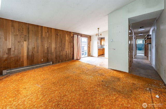 1216 E 70th St, Tacoma, WA 98404 - unfurnished living room with baseboard heating, wooden walls, and vaulted ceiling