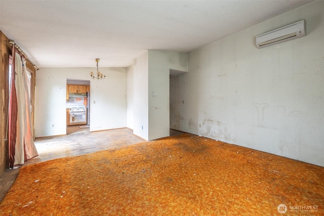 1216 E 70th St, Tacoma, WA 98404 - spare room featuring a chandelier and a wall mounted AC