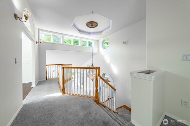 5501 55th St SE, Auburn, WA 98092 - hallway featuring an upstairs landing, baseboards, carpet, and a raised ceiling
