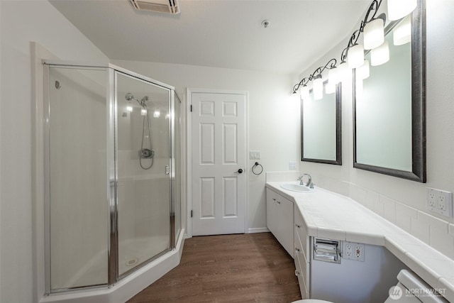 5501 55th St SE, Auburn, WA 98092 - full bath with a stall shower, wood finished floors, and vanity