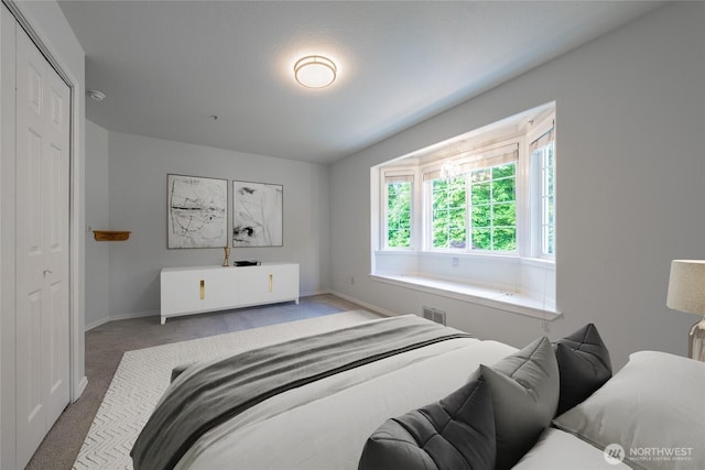 5501 55th St SE, Auburn, WA 98092 - carpeted bedroom with baseboards and a closet