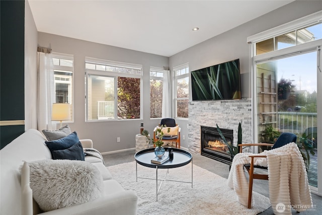 22756 SE 13th Ln Unit C6, Sammamish, WA 98075 - living room with carpet, a fireplace, baseboards, and recessed lighting