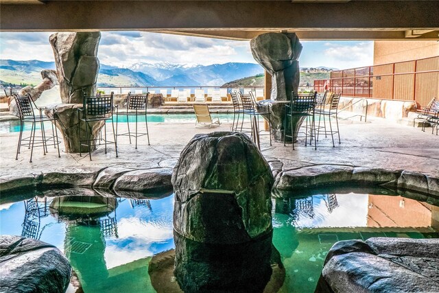 322 W Woodin Ave Unit 632, Chelan, WA 98816 - community pool featuring a mountain view and a patio