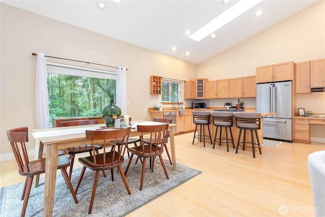 137 Sudden Valley Dr, Bellingham, WA 98229 - dining space with light wood-style flooring, recessed lighting, and high vaulted ceiling