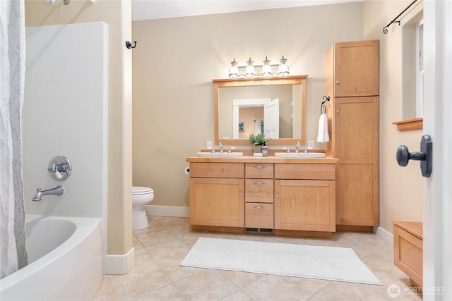 137 Sudden Valley Dr, Bellingham, WA 98229 - full bathroom featuring double vanity, tile patterned floors, toilet, shower / tub combo with curtain, and baseboards