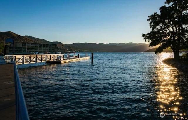 2220 W Woodin Ave Unit 303, Chelan, WA 98816 - dock area featuring a water and mountain view