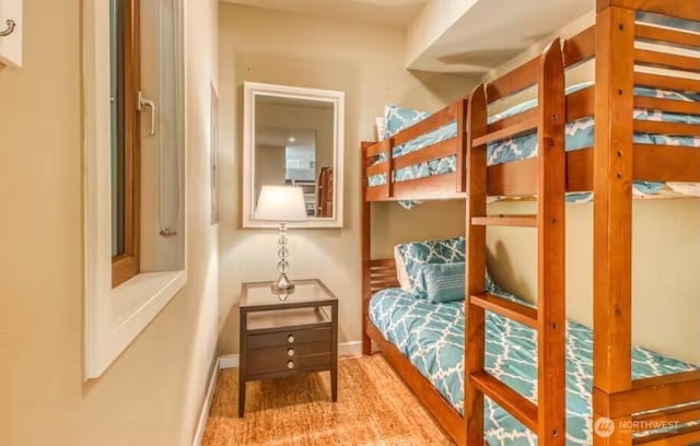 2220 W Woodin Ave Unit 303, Chelan, WA 98816 - bedroom featuring baseboards