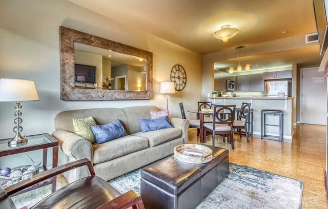 2220 W Woodin Ave Unit 303, Chelan, WA 98816 - living area featuring baseboards