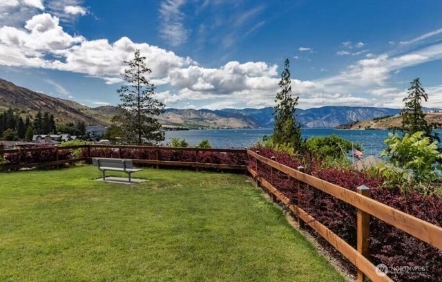 2220 W Woodin Ave Unit 303, Chelan, WA 98816 - view of grassy yard featuring a water and mountain view