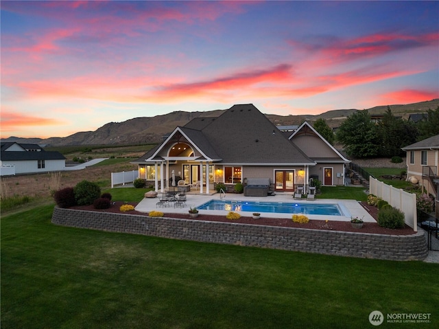 35 N Shore Dr, Orondo, WA 98843 - rear view of property with a mountain view, a patio area, and outdoor dining area