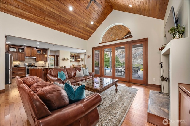 35 N Shore Dr, Orondo, WA 98843 - living room featuring high vaulted ceiling, wood ceiling, light wood-style floors, french doors, and recessed lighting