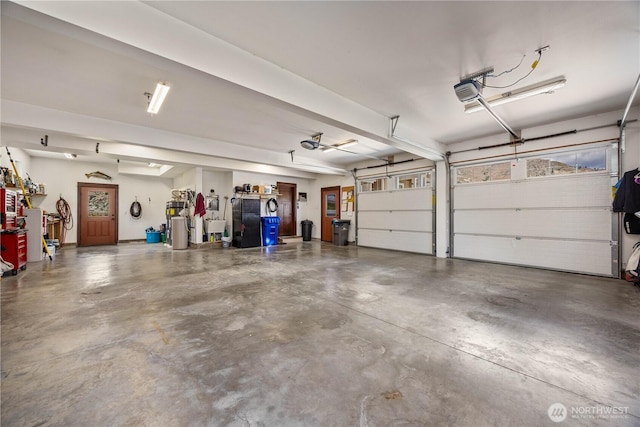 35 N Shore Dr, Orondo, WA 98843 - garage with freestanding refrigerator and a garage door opener
