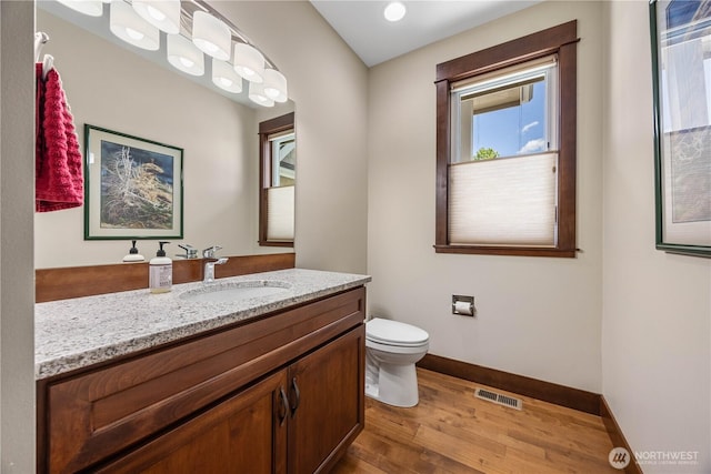 35 N Shore Dr, Orondo, WA 98843 - half bath with wood finished floors, baseboards, toilet, and vanity