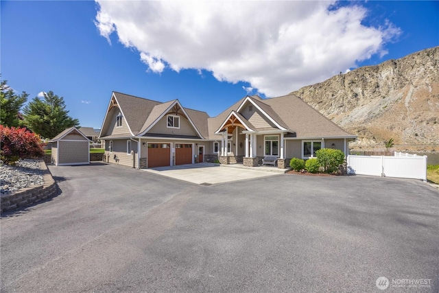 35 N Shore Dr, Orondo, WA 98843 - craftsman-style home with driveway and a mountain view