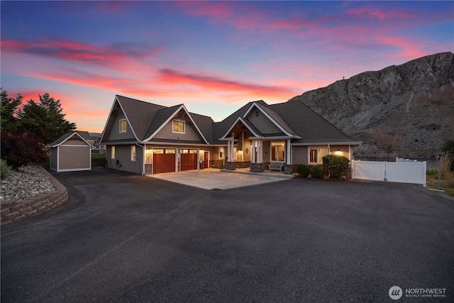 35 N Shore Dr, Orondo, WA 98843 - craftsman house with driveway and a mountain view